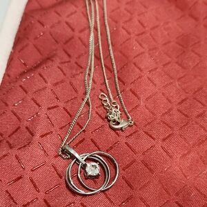 Yves Rocher Silver Circle Pendant Necklace
